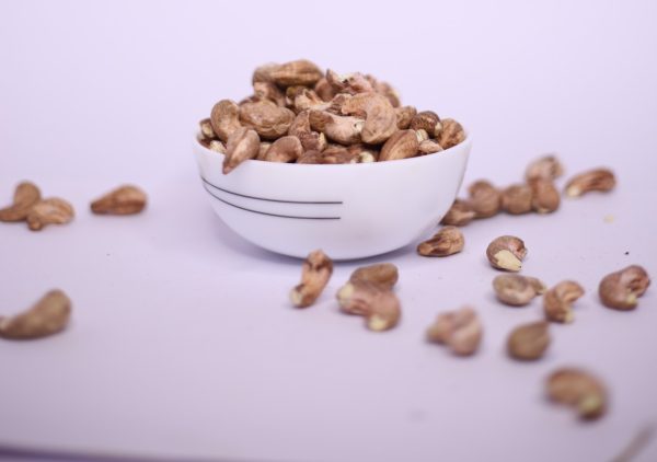 cashew with skin in bowl - malvanikonkanbazar